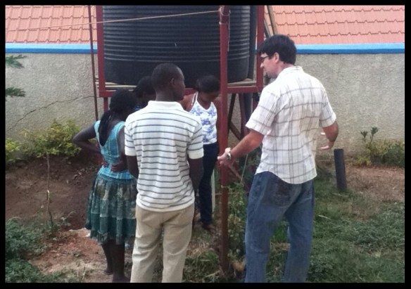 They got into a discussion about compost, so Mike explained how to start a compost heap.  (And helped Teresa start one.)